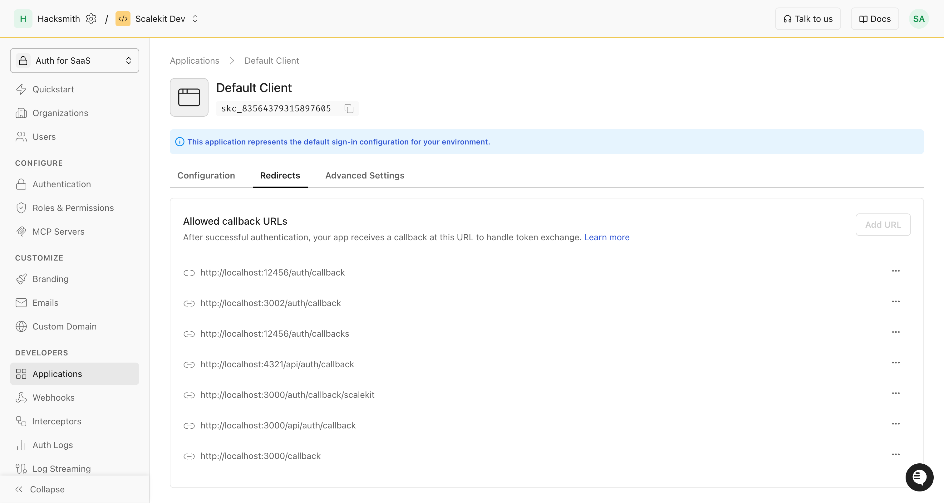 Scalekit Redirect URLs tab showing the Allowed callback URLs section with several registered callback endpoints and an Add URL button